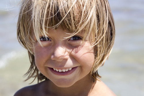 Smiling boy on the beach